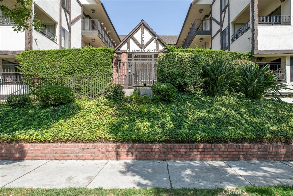 This turnkey 2-bedroom, 2-bathroom condo in the heart of Glendale offers 1,215 sq ft of beautifully updated living space, combining modern finishes with comfort and convenience. The spacious open-concept layout features a bright living room with recessed lighting and a cozy fireplace, a sleek contemporary kitchen with stainless steel appliances, and a dining area that opens to an enclosed balcony. Both bedrooms are generously sized, with the primary suite boasting a stylish dual-sink vanity and walk in closet. The unit includes a washer and dryer, two side-by-side parking spaces with extra storage in the garage, and access to a charming landscaped courtyard. Small pets are welcome, making it a perfect home for both individuals and families seeking a move-in-ready space in a desirable location close to shops, dining, and entertainment.