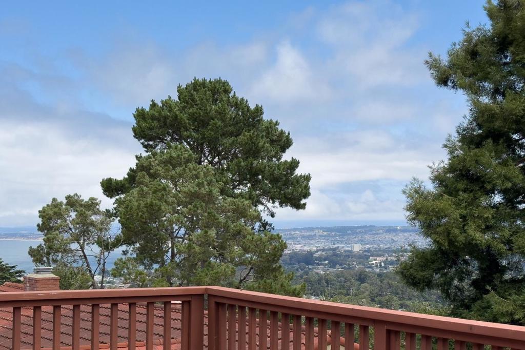 Experience stunning ocean views and an unparalleled location in the coveted Mar Vista neighborhood of Monterey! This updated 3-bedroom, 2.5-bath home is just a short walk from the vibrant Soledad and Del Monte shopping centers. The primary suite features a private deck, offering breathtaking views of the bay and Monterey Peninsulaperfect for enjoying your morning coffee while watching boats glide by and the coastal landscape come to life. Step into a chef's kitchen, complete with elegant granite countertops, a new cooktop, and a spacious island that seats four. The comfortable living room has a fireplace, built in cabinets and hardwood floors. Plus, enjoy the versatility of a detached bonus room, ideal for hobbies, yoga, or a cozy kids' hangout. With multiple outdoor spacesincluding an expansive deck designed for entertaining and drought-tolerant landscapingthis home is the perfect blend of comfort and style. Dont miss your chance to own a piece of paradise!