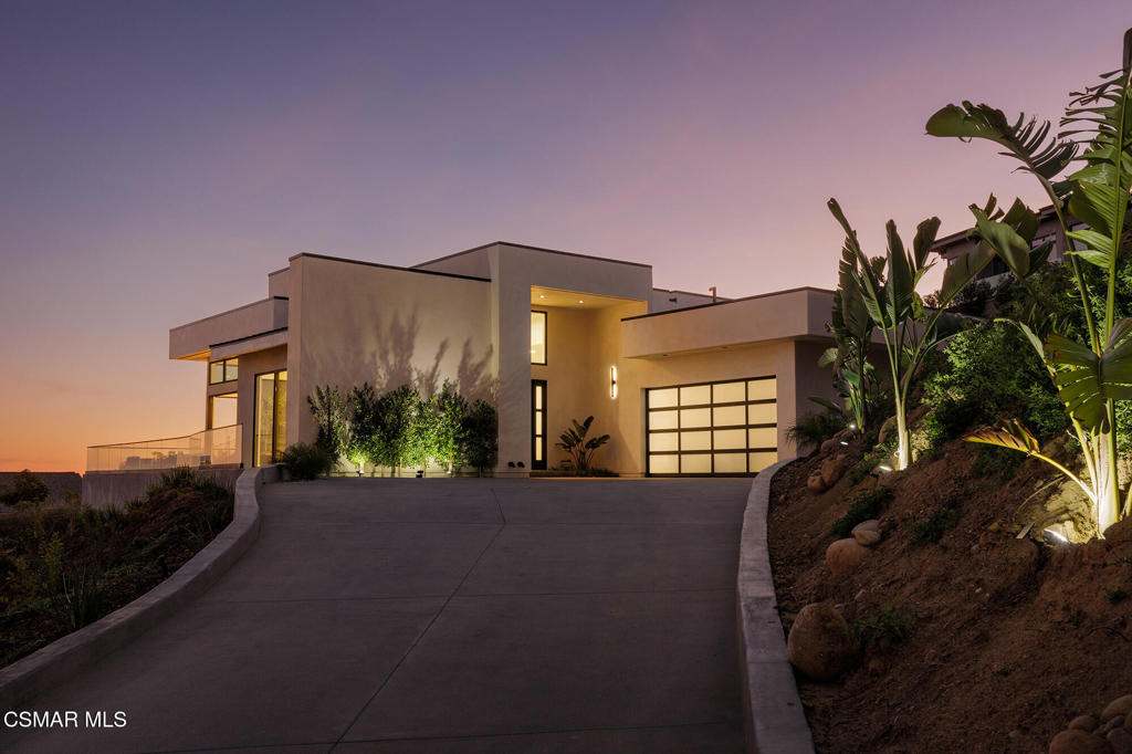 Step into unparalleled elegance with this brand-new, single-story luxury modern home, offering 180-degree panoramic views of the ocean, city skyline, and breathtaking landscapes. A masterpiece of design and craftsmanship, this home boasts soaring 15-ft ceilings that create an airy, open atmosphere throughout. Live in organic luxury with the chef's kitchen, which features top-of-the-line Subzero and Wolf appliances, complemented by exquisite rift-cut grain match white oak cabinetry and opulent Taj Mahal quartzite countertops. Whether preparing gourmet meals or entertaining guests, this kitchen is an absolute showstopper. The spacious living area is designed for ultimate comfort and modern living, with panoramic views and two bi-directional multi-slide doors that seamlessly merge the indoor and outdoor spaces. White oak flooring flows gracefully throughout, further elevating the home's refined aesthetic. The master bathroom offers a spa-like experience with custom vanities and high-end Graff fixtures, creating the perfect retreat to unwind and relax. Each of the four generously sized bedrooms features its own private, en-suite bathroom, ensuring both privacy and convenience for every resident. This spectacular home is a rare opportunity to own a property that combines breathtaking views, luxury finishes, and cutting-edge design. It's the perfect sanctuary for those who appreciate the art of fine living. Don't miss your chance to make this extraordinary home yours.