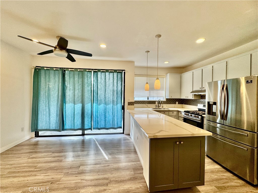Lakeside is your resort living oasis! Where you're only steps away from the pool and festivities. Soak up the sun at your pool in the daytime or unwind in the hot tub at Sunset. Upon entering your humble abode you're greeted with an open floor plan suited for indoor or outdoor entertaining. Relax in your master bedroom and enjoy your spa like shower. This move in ready home features top notch Samsung appliances including washer and dryer! All you need to bring is your deluxe wardrobe and stylish decor! Welcome home!