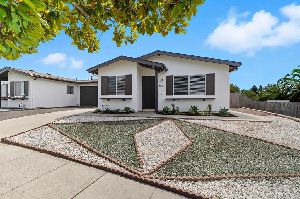 Bonus 210 sq-ft enclosed sun room not included in the official square footage. Welcome to Costa Serena—one of Oceanside’s best-kept secrets! This vibrant 55+ community is just 5 miles from the beach and has no HOA fees! Updated and well-maintained home sits on an elevated lot on a picturesque street. Attached to the neighbor only at the garage, it offers the privacy and feel of a true single-family home. New roof installed July 2017. Interior features include a remodeled kitchen and bath, ceramic tile and vinyl floors, new carpet in the sun room. The entire interior has just been freshly painted in Sherwin Williams Greek Villa, a neutral color. The sun room provides extra space for relaxation, hobbies, or entertaining. The spacious fenced backyard is a blank canvas for a garden or outdoor retreat! Large storage shed and smaller tool shed are included--tons of storage! While residents must be 55 or older, owners can be of any age, making this an ideal home for owner-occupants or investors. Located in a walkable neighborhood with tree-lined streets and sidewalks, just minutes from Hwy 78, beaches, shopping, medical facilities, and more. Don’t miss this incredible opportunity to own in one of Oceanside’s most desirable senior communities!