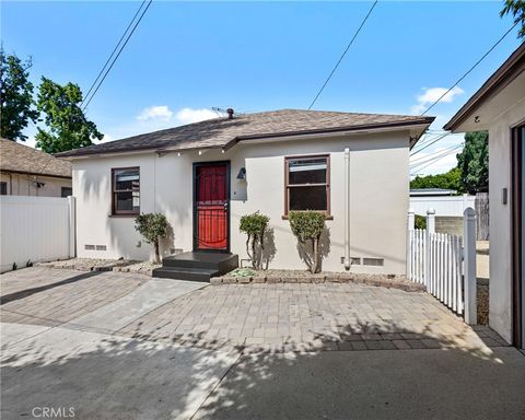 Photo of 657 659 E Jefferson Avenue, Pomona, CA 91767 (MLS # TR25181003)