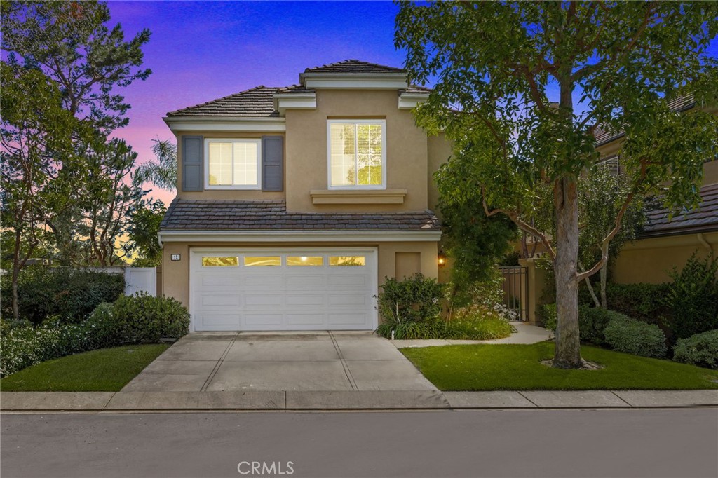 Welcome to your dream home in the exclusive gated community of Montserrat in Newport Coast. This beautifully updated 4-bedroom, 2.5-bathroom residence offers 2,473 square feet of refined coastal living, with thoughtful upgrades throughout. Tucked at the end of a long, remote driveway, this home enjoys an added sense of seclusion and tranquility, offering a peaceful retreat within the community. As you enter, you’re greeted by an open floorplan and soaring ceilings that create an airy, light-filled atmosphere perfect for both everyday living and entertaining. The inviting family room features a cozy fireplace, ideal for cool coastal evenings and relaxed gatherings. The interior of the home showcases brand-new flooring and fresh designer paint, complemented by a brand-new HVAC and air conditioning system to ensure year-round comfort. New lighting fixtures throughout the home add a modern, polished touch. The spacious layout includes a full laundry room conveniently located on the first floor, and an attached 2-car garage with direct access. Residents of Montserrat enjoy resort-style amenities including a sparkling pool, relaxing spa/hot tub, outdoor picnic areas, and a fun-filled park - perfect for enjoying the Southern California lifestyle. Located just minutes from world-class shopping, dining, beaches, and top-rated schools, this is a rare opportunity to own in one of Newport Coast’s most desirable communities.