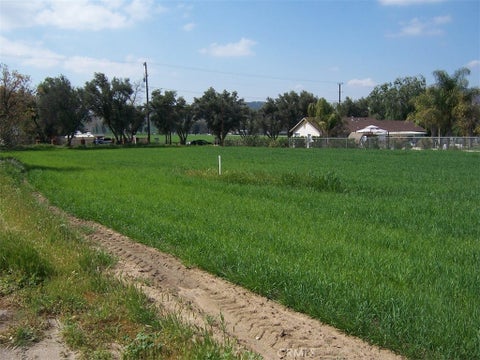 Photo of 0 RAMONA AVE., Nuevo, CA 92567 (MLS # SW26218505)