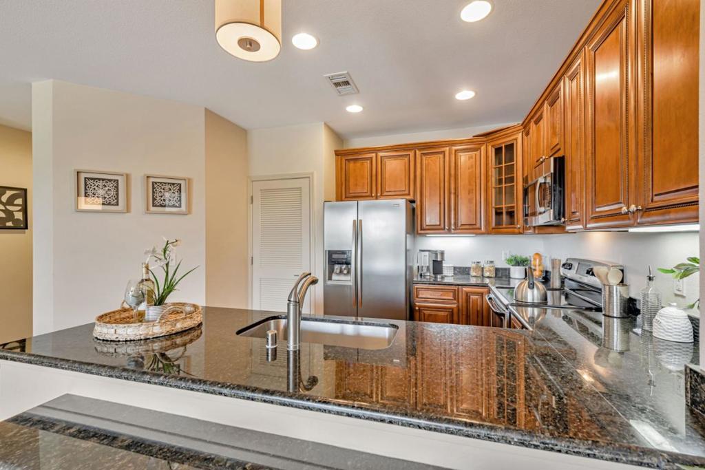 Step into comfort and style with this bright and beautifully sought-after Villa Fontana community. Bathed in natural light, the open-concept layout offers: spacious living and dining area perfect for entertaining guests. The contemporary kitchen is both functional and stylish, featuring granite countertops, plentiful cabinet space, and a generous pantry. Retreat to the spacious primary bedroom with a sizable closet and enjoy the large bathroom complete with dual sinks, a large tub and a shower stall. The second bedroom: new carpet, spacious closet, with second bathroom right across the hallway. Enjoy the convenience of in-unit full-size laundry, A/C, your own private balcony with additional outdoor storage. This secure, gated community includes: swimming pool, spa, fitness center, underground parking (two spots via tandem) with elevator access. Located near shopping, dining, public transit, major highways, this condo offers an unbeatable blend of comfort, convenience, and location. Don't miss your chance to own a beautifully maintained home in the heart of San Jose!