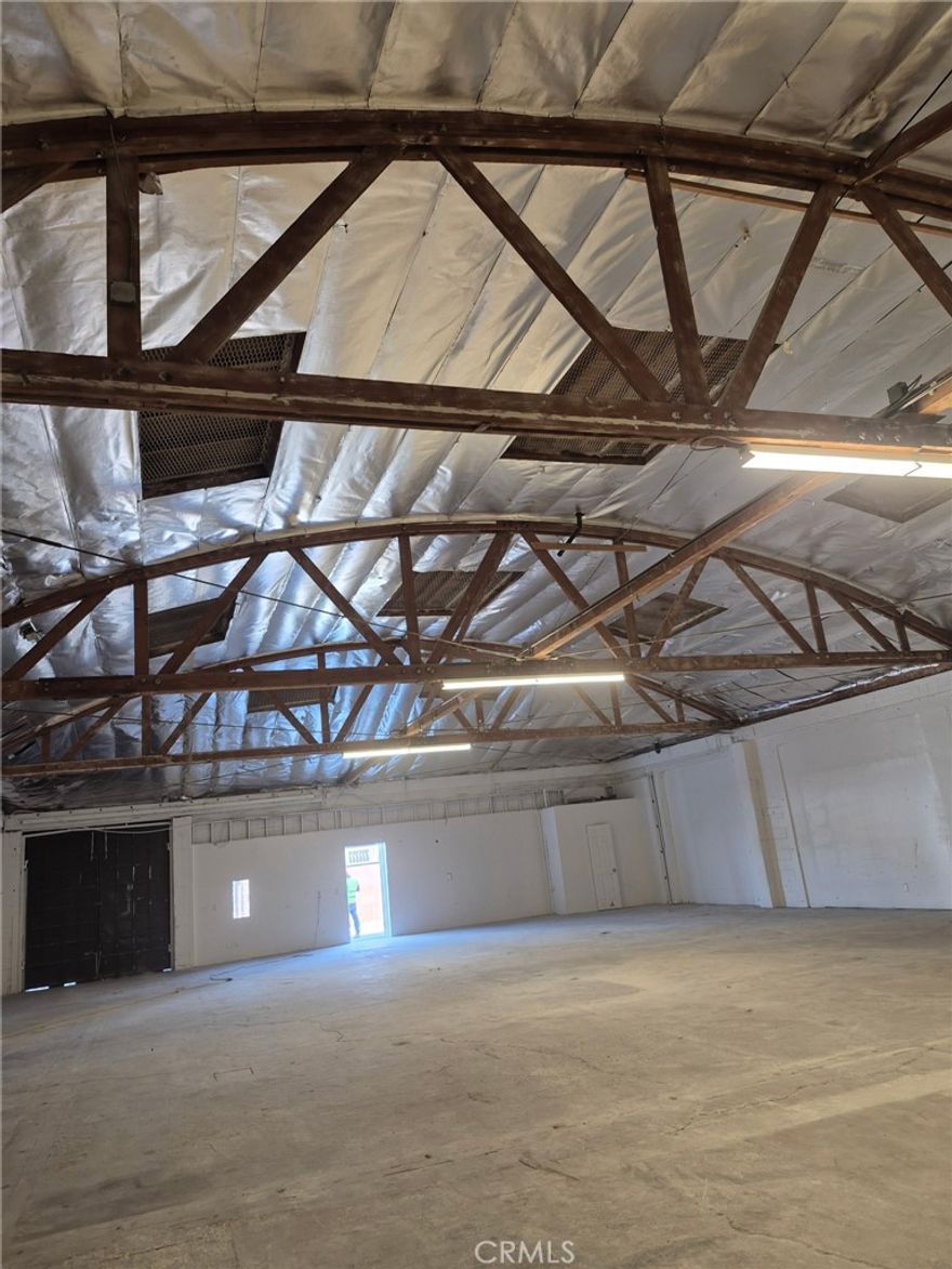 Exceptional Commercial Opportunity – Two Connected Units

Two connected commercial buildings with separate gated parking and roll-up loading doors.

Features: Recently renovated interiors, Private rear patio, Expansive open floor plan with high ceilings, New 400 Amp, 240 Volt, 3-phase electrical system

Located in a designated Opportunity Zone. Versatile space suitable for storage, light manufacturing, production, packaging, or creative workspace (buyer to verify permitted uses). Situated in a clean, secure, and quiet area.