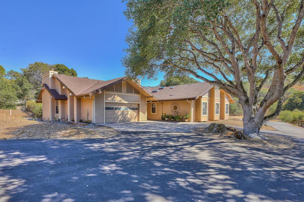 Nestled on a spacious and flat 1.22-acre lot, this property boasts two distinct homes. The main residence, built in 1994, sprawls across 4,042 square feet and features four bedrooms with two and a half baths. A second original house, spanning 1,026 square feet, offers two bedrooms and one bath. Connected by an attached breezeway, these homes present a versatile layout ideal for accommodating in-laws or caregivers or even generating rental income$$ from the second house. The main house welcomes you with a grand open living room, complete with high ceilings that create an airy and inviting atmosphere. A spacious kitchen flows seamlessly into a large family room, providing an excellent space for family gatherings and entertainment. Cedar-lined closets in all bedrooms add a touch of luxury and functionality. Step outside to a sprawling patio area, perfect for hosting BBQs or simply basking in the warm sun. The front house includes a two-car garage, while the back house offers a garage/shop area, catering to various storage and hobby needs. Efficiency is key with an owned solar system, ensuring substantial savings$$ on monthly energy bills. The expansive back half of the lot offers endless possibilities, whether you envision RV/boat parking, a pool oasis, or a sizable workshop.