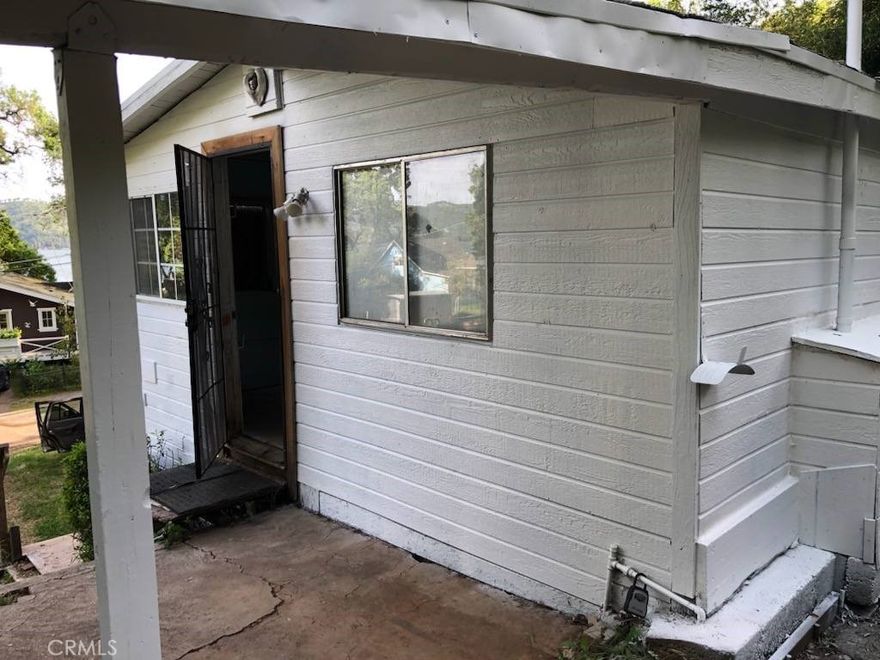 SELLER FINANCING AVAILABLE! Are you looking for your next project? Something where you not only instantly earn "sweat equilty" but also gives you that  tremendous sense of self satisfaction that only comes with creating something truly special? Well then this cabin near the lake might be exactly what you are looking for. An affordable addition to your real estate portfolio. This little cabin in the woods is waiting for someone with the time, skills and vision to restore it to its former glory. A fixer upper with a tremendous upside.