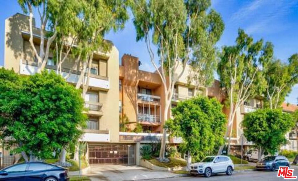 Make yourself at home in the vibrant heart of West Hollywood. Brandly renovated, with brand new appliances and wood flooring. Located between Melrose and Santa Monica Boulevard, this lovely one-bedroom, one-bathroom condominium offers proximity to parks, trendy shops, five-star restaurants and a thriving nightlife scene. Warm hardwood floors greet you as soon as you enter. Cook and entertain in a bright kitchen with granite countertops, appealing wood cabinetry, all new stainless steel appliances, and a passthrough bar where you can sip your morning coffee. The level of convenience, safety, and comfort this unit offers in unparalleled. Cozy up near the fireplace on colder evenings and spend weekend afternoons on the private balcony overlooking the verdant courtyard. Enjoy a spacious walk-in closet, tiled standing shower, and appealing details, including wainscotting and arched doorways. Building amenities include one parking space and ample visitor and street parking, a robust fitness center, sauna, spa, an entertainment room equipped with a kitchen and area and pool table, perfect for entertaining guests. For outdoor enthusiasts, the rooftop sun deck offers a BBQ grill and panoramic 360-degree views, overlooking the beautiful Los Angeles skyline.