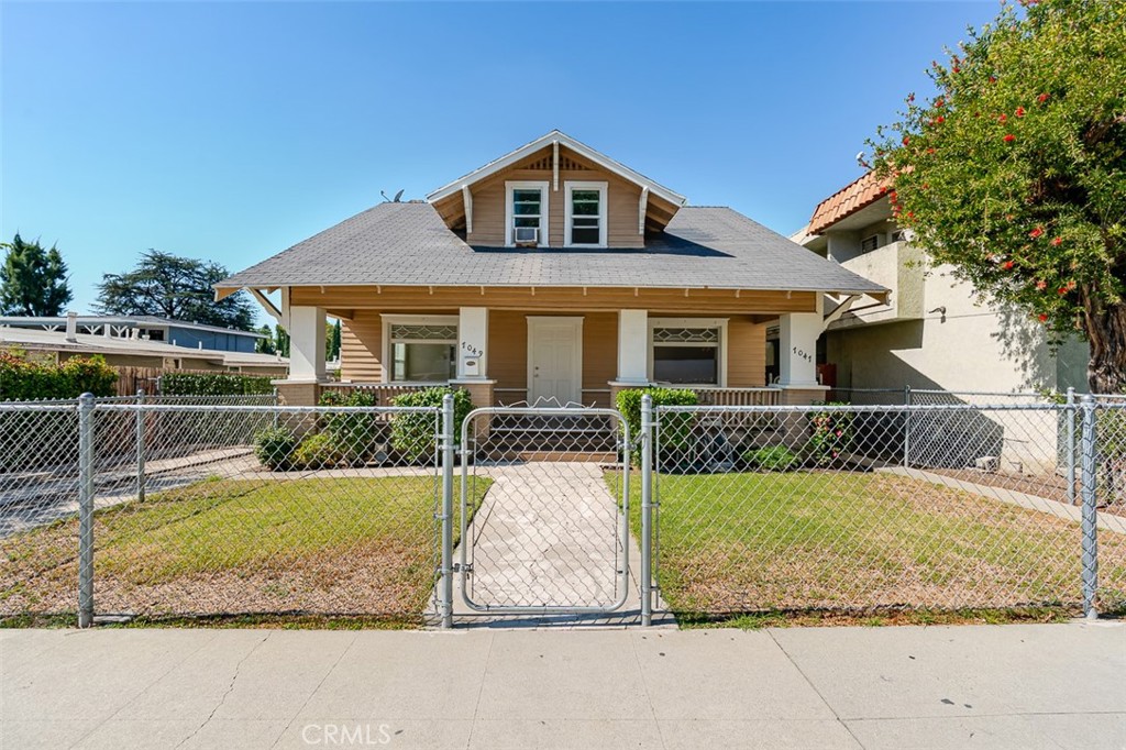 Beautifully updated duplex located in a desirable Whittier neighborhood near Uptown Whittier, close to shops, restaurants, and markets. The downstairs unit features 3 bedrooms and 1 bathroom, a spacious living room, a formal dining room with a fireplace, a laundry area, and a welcoming front porch overlooking the fenced front yard. The upstairs unit offers 1 bedroom and 1 bathroom with a bright and open layout. Both units are equipped with double-paned windows and their own laundry areas for added comfort and convenience. Recent upgrades include newer wood flooring, fresh interior paint, and remodeled kitchens and baths. The property also includes a two-car garage and a large backyard with ample space for additional parking. This versatile property is ideal for investors, house hackers, or owner-occupants seeking flexible living and strong income potential.