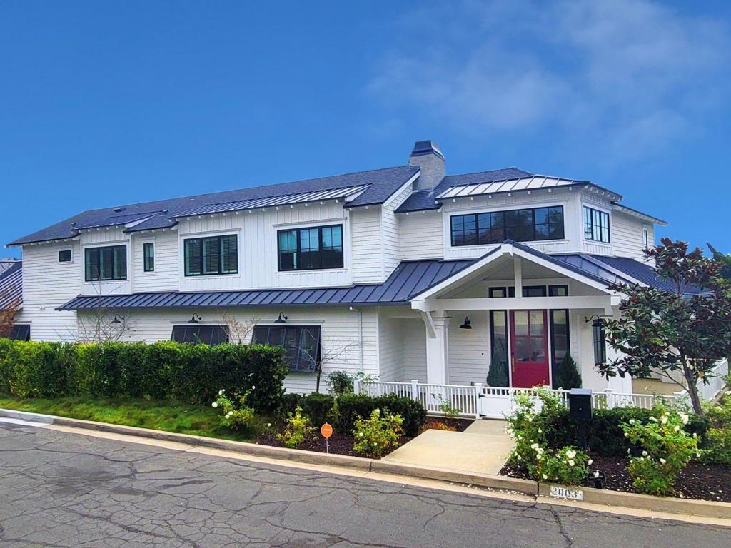 Breathtaking Modern Farmhouse constructed in 2017 from the ground up and situated perfectly on a quiet cul de sac on an expansive flat corner lot on nearly ½ an acre. Exquisite attention to detail is apparent throughout this home beginning with the formal grand entry with its 20’ high ceilings and grand staircase. Just around the corner you are welcomed into the main living space with one of the several impressive fireplaces throughout the home and an incredible indoor/outdoor floor plan. Open concept living as the great room seamlessly opens to the chef’s kitchen which features gold accent fixtures throughout, a double island, 6 burner Dacor range with double oven, Sub Zero refrigerator, Miele built-in cappuccino maker, wine refrigerator, butler’s pantry with extra refrigerator, ice maker, and dishwasher. Ample built-ins for storage throughout. The seamless indoor/outdoor flow is made possible by 50 feet of full pocketing doors that open to an extremely private expansive backyard. Views of mature lush trees, vanishing edge pool, over 2,100 sf of covered patio space and your very own 22’ high outdoor living area equipped with a full bar, fireplace/heaters, and 130” video wall and sound system for impressing guests. There is also an entire spa room off of the pool area equipped with an oversized steam shower and sunken soaking tub. This home was built to entertain! No attention to detail was spared throughout. Directly off of the main entry you will find the expansive master suite with coffee bar, large closet with center island, another impressive fireplace, & dual vanities with self-standing tub in the primary bath. Throughout the rest of the home you will find multiple bedrooms with en-suite baths, office, gym, a gated drive & an expansive 4 car garage with a private staircase that takes you to a large bonus room (8th bedroom) with limitless possibilities. Tucked away in a quiet cul de sac in the Muirlands just a short scenic drive to all La Jolla has to offer, you will not find another property with this character & attention to detail. Architectural Style: Custom Built View: Custom Built Equipment: Fire Sprinklers,Pool/Spa/Equipment Sewer: Sewer Connected Topography: LL