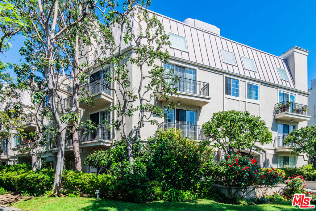 Discover refined living in the heart of Beverly Hills with this beautifully appointed 3-bedroom, 2.5-bathroom residence. Located in a coveted and serene neighborhood, this unit offers a blend of luxury, comfort, and convenience. Step into a formal entryway that leads to a spacious open-concept living area adorned with marble flooring, a cozy fireplace, and two private balconies perfect for entertaining or unwinding in style. The chef's kitchen is a culinary dream, featuring a sleek marble backsplash, granite countertops, stainless steel appliances, a breakfast bar, and ample cabinetry. Included are a refrigerator, stove, oven, microwave, and an automatic dishwasher. The expansive primary suite boasts its own private balcony, a generous walk-in closet, and a luxurious en-suite bathroom complete with a spa tub, separate glass-enclosed shower, and dual vanities. Both the second and third bedrooms feature rich hardwood flooring and large windows that invite abundant natural light, creating a warm and airy ambiance throughout. Additional Features: In-unit washer and dryer, In-unit AC and Heating systemPet-friendly, and Smoke-free environment. Building Amenities: Rooftop access with scenic views of the surrounding hills, Wheelchair accessibility, Two assigned, side by side, parking spaces + additional storage unit in garage, 9 spaces for Guest Parking available. Tenant responsible for utilities of gas and electricity. Water, sewage, and trash services are covered by the Landlord