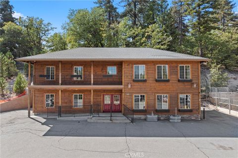 Photo of 31961 Hilltop Dr, Running Springs, CA 92382 (MLS # IG25227161)