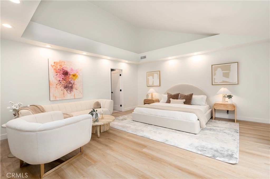 Welcome to 2911 S Ridgeley Dr, a beautifully reimagined contemporary home in the up and coming West Adams neighborhood adjacent to Culver City. Nestled on a quiet cul-de-sac, this extensively renovated 4-bedroom, 4-bathroom residence with a bonus room blends thoughtful design and modern luxury in a friendly, spacious setting. Enjoy a bright, open floor plan featuring soaring vaulted ceilings in both the living room and upstairs primary suite. Two spacious primary suites, one on each level, offer ultimate flexibility and privacy, with the downstairs suite perfect as an entertainment lounge, guest retreat, or multi-generational living space. Three upstairs bedrooms each include private balconies, ideal for morning coffee or relaxing outdoors. The chef’s kitchen is a centerpiece, boasting custom oakwood cabinets, designer quartz countertops, under-cabinet LED lighting, and brand-new professional-grade Thor appliances. Designer Luxury Vinyl Plank and tile flooring flow throughout, complemented by solid wood interior doors, LED-lit staircase, and new closet doors. A dedicated laundry area features a new GE washer/dryer and an easy-access laundry chute from the second floor. Thoughtfully upgraded throughout with all-new plumbing and lighting fixtures, WiFi-enabled dimmer switches, new electrical outlets, Nest thermostat, energy-efficient windows, a cool new roof, and a new water heater. Bathrooms shine with oakwood vanities, frameless glass showers, and new one-piece toilets. Outside, enjoy professionally designed landscaping in the front and back yards, secured by a custom motorized gate, automatic garage door, and additional driveway parking.If you love the outdoors, nearby Kenneth Hahn Park offers hiking trails, picnic areas, and panoramic views. Walk to Westside Neighborhood Park, grab your morning coffee at local favorites like Muso or Alchemist Coffee, or hop on the Metro E Line for a direct route to Santa Monica and Downtown LA. Bike the Ballona Creek path or explore nearby Culver City, Beverly Hills, and Playa Vista. Centrally located near the 10 Freeway and Expo Light Rail station, this home is minutes from Whole Foods, Westside Neighborhood Park, and the headquarters of Apple TV+, HBO, and Amazon, plus the vibrant Arts District, offering unbeatable access to the best of LA.
Live stylishly. Live spaciously. Live Ridgeley.