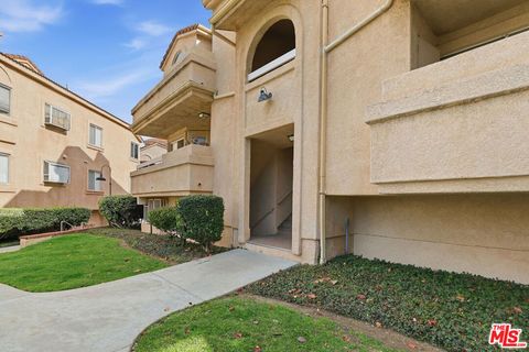 Photo of 19834 Sandpiper Place #64, Newhall, CA 91321 (MLS # 26665765)