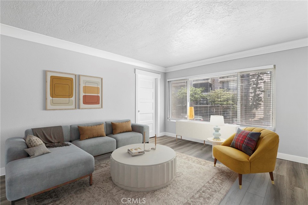 Welcome to Cedar Towers, a charming mid-century, three-story condominium building located in West Village, one of Downtown Long Beach’s most walkable and eclectic neighborhoods. This beautifully remodeled 1-bedroom, 1-bath end unit blends modern updates with classic mid-century architecture, offering residents easy access to the dynamic urban lifestyle Long Beach is known for. Just six blocks from the beach and steps from The Pike, Shoreline Village, the Metro line, and a vibrant mix of shops, dining, and entertainment—this is city living at its finest. Inside, the unit features a bright, efficient layout with new flooring throughout, a stylishly updated bathroom, and a modern kitchen with sleek quartz countertops and newer cabinets. The living room is filled with natural light, thanks to large windows showcasing sweeping city views. As an end unit, it offers added privacy, minimal shared walls, and plenty of closet space for convenient storage. Cedar Towers provides secure access, a lush tropical courtyard, elevator, and on-site laundry facilities. HOA dues include water, trash, sewer, insurance, common area maintenance, and professional property management.
Whether you're a first-time buyer, investor, or simply looking for a low-maintenance coastal lifestyle, this move-in ready condo is a standout opportunity in one of Long Beach’s most sought-after urban communities.