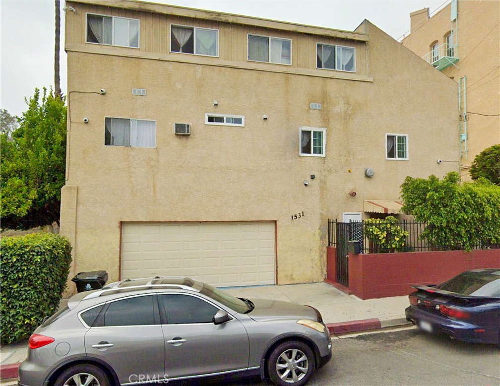 CALLING ALL INVESTORS! Investor/Developer Opportunity in Prime Hollywood Location! Don’t miss this incredible redevelopment opportunity in one of the most sought-after areas of Hollywood. Situated on a prime LAR4-zoned lot, this property offers endless potential for developers looking to build multi-family residences in the heart of Los Angeles.
The existing structure is a 1,542 sq. ft. home featuring 2 bedrooms, 2 bathrooms and a 2-car garage.
Perfectly positioned between Sunset Blvd and Hollywood Blvd, this property is within walking distance to the Hollywood Walk of Fame, the Netflix building, and an array of shops, dining, and entertainment. Just minutes away from Griffith Park, Los Feliz, Dodger Stadium, and Downtown LA, the location is second to none.
This is a rare chance to reimagine a property with tremendous upside in the vibrant heart of Hollywood. Bring your vision—this one won’t last!