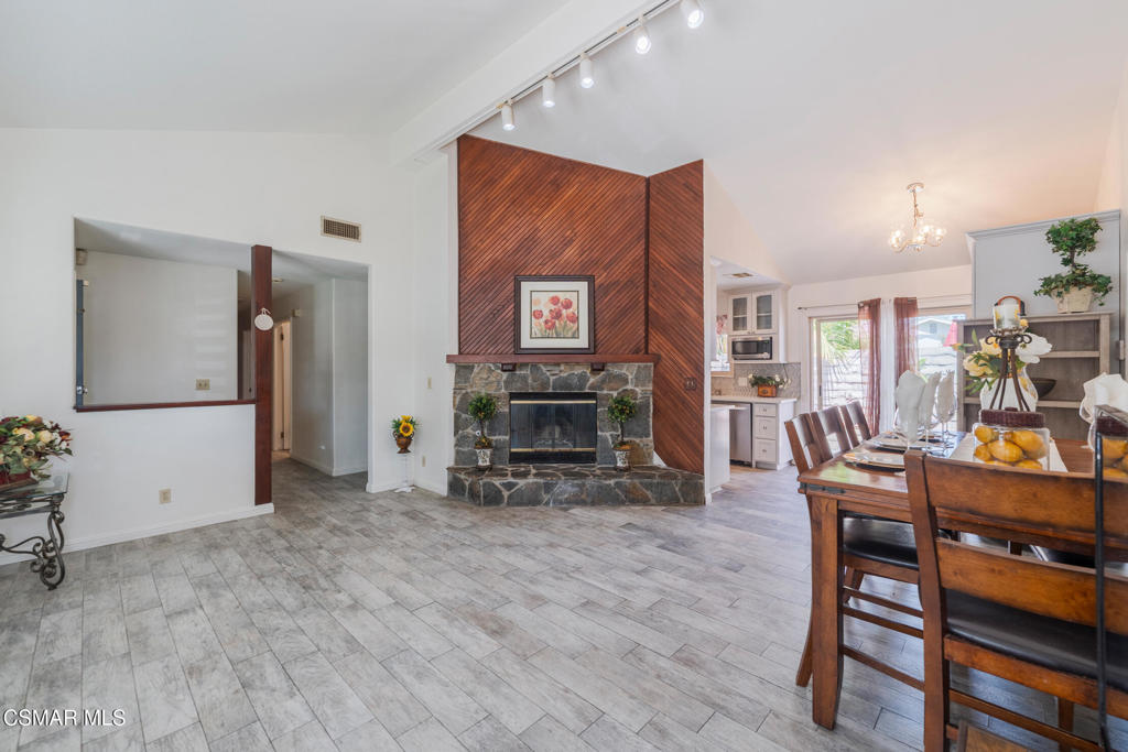 This beautiful single-story home offers 3 bedrooms and 2 baths, with high vaulted ceilings. The welcoming living room features a fireplace with a large mantel that provides a cozy atmosphere. Newer tile flooring, a newer remodel kitchen, with Quartz counters, stainless steel appliances, subway tiles, and newer cabinetry , newer paint, plantation shutters, dual-pane windows , and renovated bathrooms. FULLY PERMITTED GARAGE CONVERSION, with 416 sqft. which features a private entrance with 2 Bedroom and a bath of living space, which can provide an additional source of income for buyers. The extra large carport offers a side yard for extra parking or endless possibilities, such as storing a boat or trailer. The oversize backyard offers plenty of privacy, large mature trees. This beautiful home is conveniently located in the heart of Simi Valley, with nearby shopping, transportation, parks, and schools. Must see to appreciate all the potential. I look forward to seeing you in Escrow.