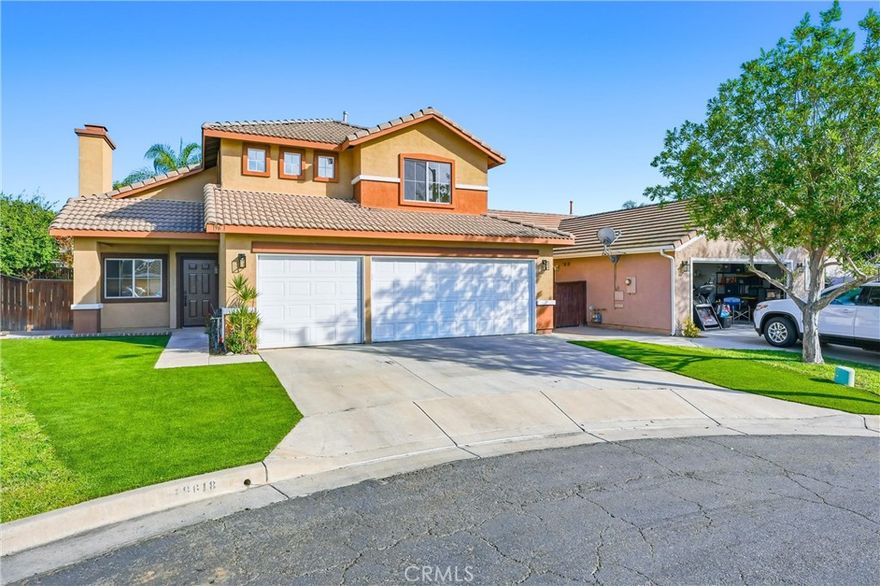 Welcome to this beautifully upgraded Mission Grove gem, located in the highly desirable Stonegate gated community and tucked away at the end of a quiet cul-de-sac. This inviting home offers a bright, open-floor plan with 3 bedrooms, 2.5 bathrooms, plus two additional bonus rooms for flexible living.  Inside, you’ll find wood-style plank flooring, quartz countertops, and shaker cabinetry throughout. The chef’s kitchen is a true highlight, seamlessly open to both the living and dining areas—perfect for entertaining. The living room features a sleek, modern fireplace, adding both warmth and style.  Both the living and dining rooms open to a spacious enclosed patio with wall-to-wall windows overlooking the expansive backyard. This versatile space adds valuable square footage and can be used as a family room, home office or gym, playroom, or even a home theater—the possibilities are endless. The primary suite offers high ceilings, recessed lighting, and a large window that fills the room with natural light. The spacious primary bath includes a soaking tub and shower with glass enclosure, quartz countertops, shaker cabinetry, and a generous walk-in closet with built-in organizers. Two additional bedrooms are well-sized and feature views of the front of the home. The upstairs hall bath and downstairs guest bath have also been tastefully upgraded. A bonus is the converted third-car garage, now a functional living space with direct access to the home—ideal as a main-level room for guests or extended living. The low-maintenance backyard is impressively large, making it perfect for entertaining, hosting gatherings, or enjoying sports and outdoor activities. Both the front and backyard feature high-quality turf, supporting an eco-friendly, easy-care lifestyle.  Additional highlights include a gated community with a private park, interior fire sprinkler system, freshly painted interior and exterior fascia, and a true turnkey condition. Conveniently located near Mission Grove Village shopping and dining, with easy freeway access to the 91, 215, and 15.
This home truly has it all—style, space, and an unbeatable location.