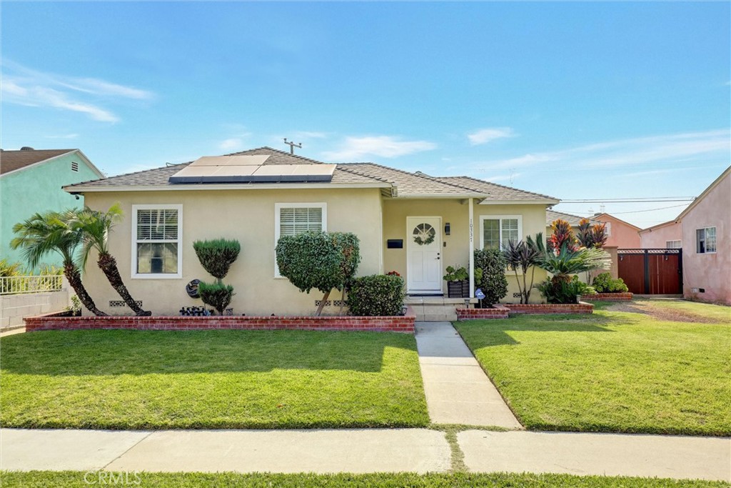 Welcome to 10337 Garfield Avenue — a charming and thoughtfully updated 3-bedroom, 2-bathroom home offering 1,459 square feet of living space in the desirable Hollydale neighborhood of South Gate, adjacent to Downey.
Step inside to an inviting open floor plan featuring recessed lighting, durable laminate flooring, and a spacious living room that flows seamlessly into the dining area and den. The bright kitchen offers timeless white tile countertops and ample cabinet space, freshly painted in a modern tone. The home also includes newer dual-pane windows, ceiling fans, and a flexible layout ideal for work-from-home setups or extended family living.
Major system upgrades include a newer roof (2020) and solar panels with backup power, delivering energy efficiency and peace of mind. Outside, enjoy a private backyard retreat with a built-in brick BBQ, patio TV setup, and lush landscaping perfect for entertaining or relaxing.
This move-in-ready home also offers a 2-car detached garage and is located within the Downey Unified School District, offering access to highly regarded local schools.
Don’t miss the opportunity to own this well-maintained, upgraded home in a central location with great curb appeal and a lifestyle to match..