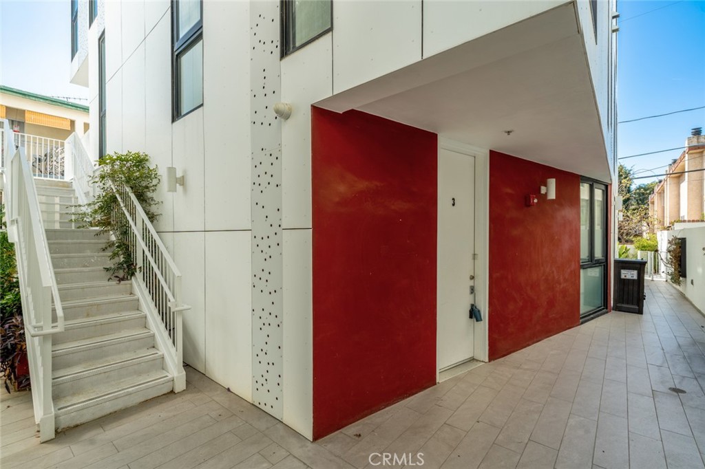 Stunning LOHA-Designed Modern Condo in the Heart of West Hollywood
Experience luxury living in this impeccably designed two-story condo by renowned architectural firm LOHA, nestled in the vibrant heart of West Hollywood. This sophisticated residence blends modern elegance with thoughtful design, featuring soaring ceilings and expansive floor-to-ceiling windows that flood the space with natural light.
The open-concept interior showcases large-format tile flooring and a sleek chef’s kitchen, complete with a striking waterfall island, streamlined ventilation, pendant lighting, and recessed illumination. Perfect for entertaining or quiet evenings at home.
Upstairs, dual master suites offer serene retreats with generous walk-in closets and spa-inspired en-suite bathrooms. Each bath features an elegant floating vanity with a large round mirror and oversized enclosed showers, creating a luxurious, spa-like ambiance.
A cozy private patio extends your living space outdoors—ideal for morning coffee or evening relaxation.
Located just steps from the iconic Sunset Strip, you’ll enjoy proximity to Chateau Marmont, legendary comedy clubs, and live music venues. Walk to Santa Monica Boulevard for an array of lively bars, shops, dance clubs, and some of LA’s most celebrated restaurants. This is urban living at its finest in one of the city’s most desirable neighborhoods.