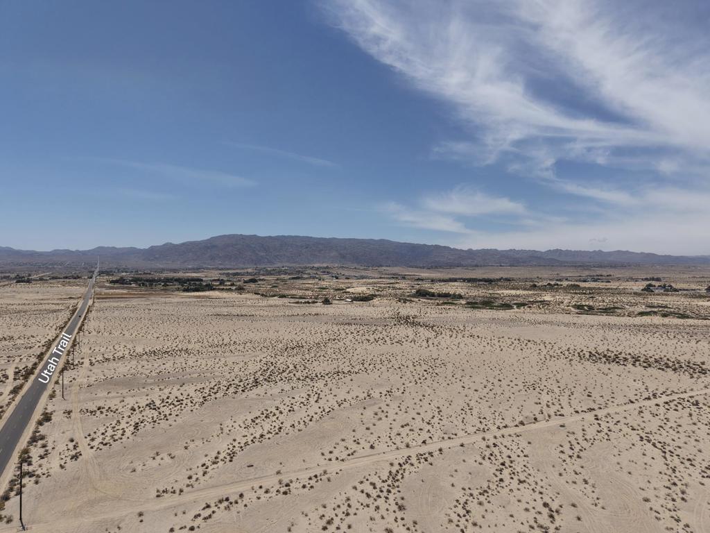 Development potential! Eighty acres on the SW corner of Utah Trail and Indian Trail. Zoning allows for +/- 30 houses (one dwelling per 2.5 acres) if subdivided. Power and water at Utah Trail. APN 0621-281-21