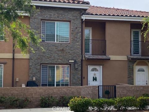 Photo of 16408 Valencia Ave #411, Fontana, CA 92335 (MLS # CV26080743)