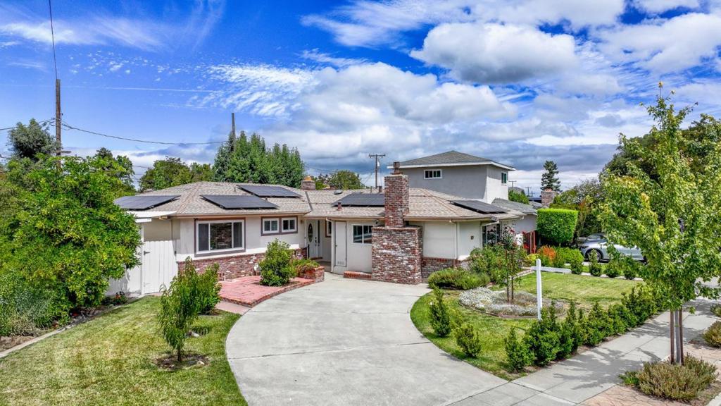 Spanning 1681 sqft on a 6144 sqft lot, this residence seamlessly blends modern comfort with eco-friendly living. Enjoy peace of mind with a newer roof and full solar system already installed, resulting in no electricity costs plus an annual credit of approximately $1000 from the power company, a rare and valuable bonus. The gourmet kitchen boasts Euro-design cabinets, newer appliances, and elegant quartz countertops, creating a sleek and functional space for culinary enthusiasts. A separate family room provides extra space for relaxation or entertainment, while the inside laundry area comes complete with a washer and dryer for added convenience. Step outside to find a detached office (not included in the square footage)ideal for remote work or a private studio. Additional highlights include a newer roof, tile and vinyl/linoleum flooring, energy-efficient double pane windows, a gas fireplace, and central AC for year-round comfort. Situated in a quiet, walkable neighborhood near parks, shops, and top-rated schools, including Cumberland Elementary, Sunnyvale Middle, and Homestead High, this home offers the perfect blend of style, sustainability, and convenience. Don't miss the opportunity to experience all that Sunnyvale living has to offer in this exceptional home!