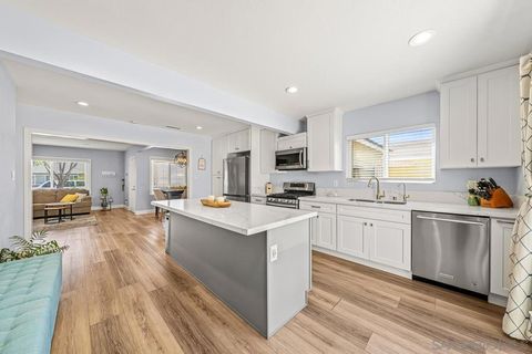 Photo of 6009 Briercrest Ave, Lakewood, CA 90713 (MLS # 260008325SD)