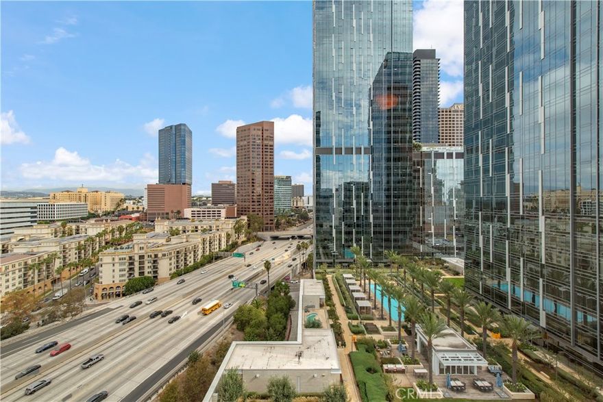 Experience elevated urban living in this rare corner residence at Metropolis Los Angeles.

Perched on the 8th floor of one of DTLA’s most luxurious complexes, this spacious home showcases breathtaking panoramic views of the city skyline, glittering high-rises, and the iconic Hollywood Hills — visible from every bedroom, the living room, and even the kitchen.

Inside, the residence offers two generous bedrooms, two full bathrooms, plus a rare additional powder room — providing three restrooms in total for exceptional convenience and comfort.

The Metropolis lifestyle is second to none. Residents enjoy resort-style amenities including a shimmering pool and spa, a fully equipped fitness center, a chic resident lounge, 24-hour security, gated access, and a dedicated front-desk concierge. Two secured parking spaces are included.

Location, location, location — and this one truly delivers. Step outside and you’re just moments from Crypto.com Arena, L.A. Live, and all the dynamic nightlife, fine dining, and entertainment that downtown Los Angeles is famous for. Plus, you’re only minutes away from Beverly Hills and other premier LA destinations.