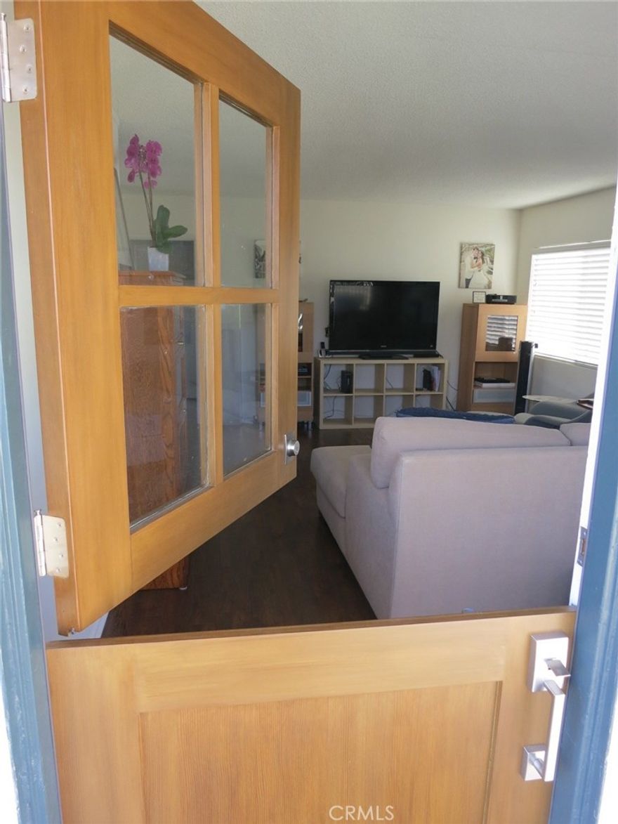Spacious and updated 2 bedroom/1 bath apartment located on one of the "tree streets" of north Laguna. This highly desirable area is

within a few blocks to the beach, the pathways along Heisler Park with breathtaking views of the Pacific and walking distance to

downtown shops, restaurants and galleries! This property offers wood laminate floors throughout and the custom dutch door and sliders in the living room add lots of light and access to the front patio. One car garage and shared laundry! Must see this beautiful apartment!! Rent includes trash collection and water.