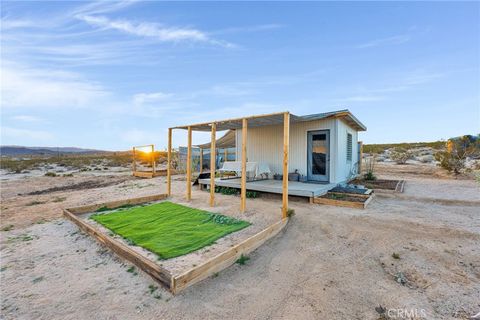 Photo of 68476 Pole Line, 29 Palms, CA 92277 (MLS # CV25276599)