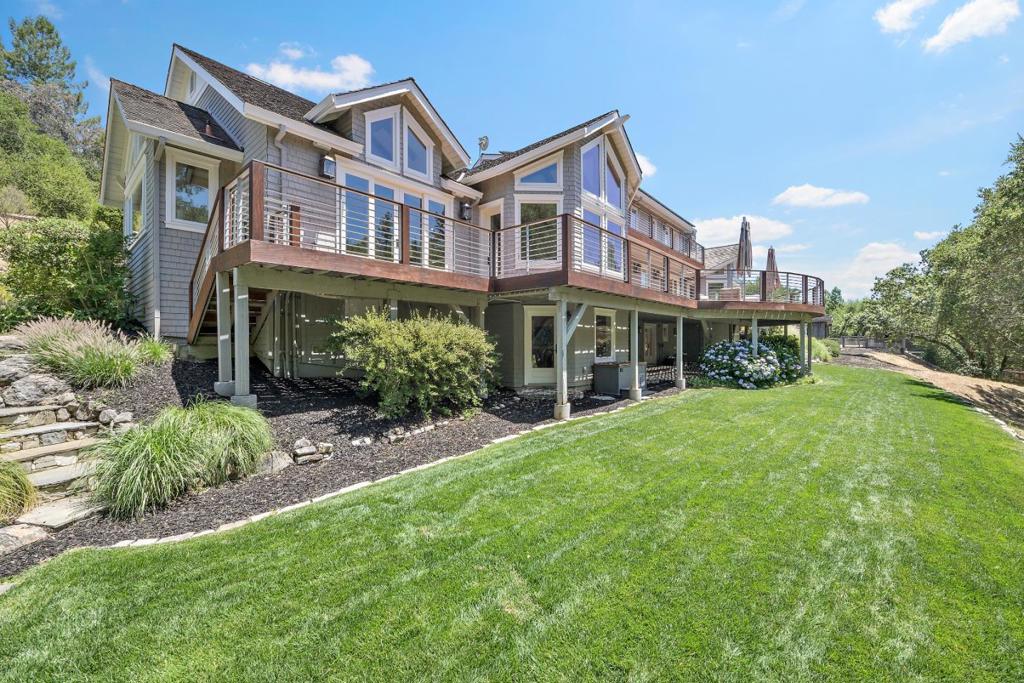 Stunning Custom Built 3 Level Home with Guest Cottage and Pool on 4.37+/- Acres with Stables and Riding Ring on Private Cul-de-Sac in Central Woodside. 5 Bedrooms. 5.5 Bathrooms. Living Room Features Vaulted Ceilings, Wood Floors, and Floor-to-Ceiling Windows. Spacious Kitchen with Large Island, Peninsula and Views of the Pool and a Pond. Intimate Family Room with Sliding Glass Doors to Pool. Library with Fireplace. Wine Room, 3 Laundry Rooms, and Large Fitness Area with Sauna and Steam Room. Outdoor Cold Plunge. Three-Car Garage. Ipe Decking, Pool, Large Pool House, and Outdoor Kitchen. Guest Cottage. Sand Riding Arena and Horse Stables with 8 Stalls and Loft. Situated Hillside for Amazing Views.