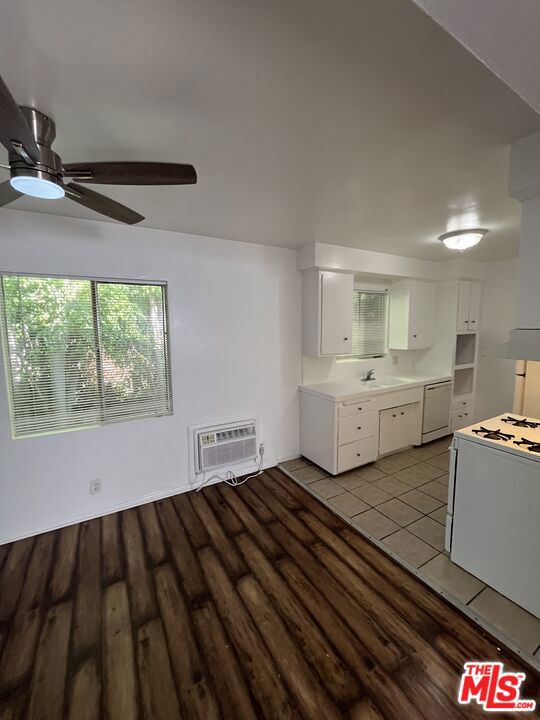 Welcome to your new home in the heart of Studio City! This spacious 1-bedroom, 1-bath residence offers approximately 780 square feet of fresh, modern living. Recently updated with new glaze, blinds, and fresh paint, the unit feels bright and inviting from the moment you step inside. Enjoy the comfort of a private balcony, complete with artificial grass and a built-in doggy door perfect for both relaxation and your furry companion. The open layout maximizes natural light, while thoughtful upgrades provide a move-in ready experience. Ideally situated, this home offers a blend of style, convenience, and pet-friendly features in one of LA's most desirable neighborhoods.