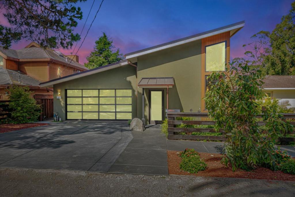Welcome to this gorgeous two year old custom, contemporary, meticulously designed and built single level home in the desirable and sought out Vallemar neighborhood. Eye catching curb appeal with inviting landscaping, synthetic color coat exterior stucco, metal standing seam roof with copper gutters and downspouts. Inviting open living area with soaring ceilings, porcelain tile flooring throughout, Marvin custom clad windows and exterior doors with wood interiors. Radiant Heat System with fully insulated slab, each room separately zoned including garage. Knight boiler, Uponor PEX/manifolds and Ecobee smart thermostats. On demand domestic water heater. Gourmet kitchen features quartz counters, stainless steel JennAir gas range and over, JennAir refrigerator, Bosch dishwasher, Zephyr hood fan and built in TCL wine refrigerator. Primary suite with built ins, walk in closet and fantastic lighting. Masterfully designed and built with the highest quality materials and attention to detail. The custom oversized windows bring in the natural light and give the home a warm inviting feel. Rear doorway leads to a Bamboo deck, established landscaped yard, patio and barbecue area and low maintenance turf. Located on a very quiet street yet with easy access to hwy 1 and beyond. Completed 7/2023.