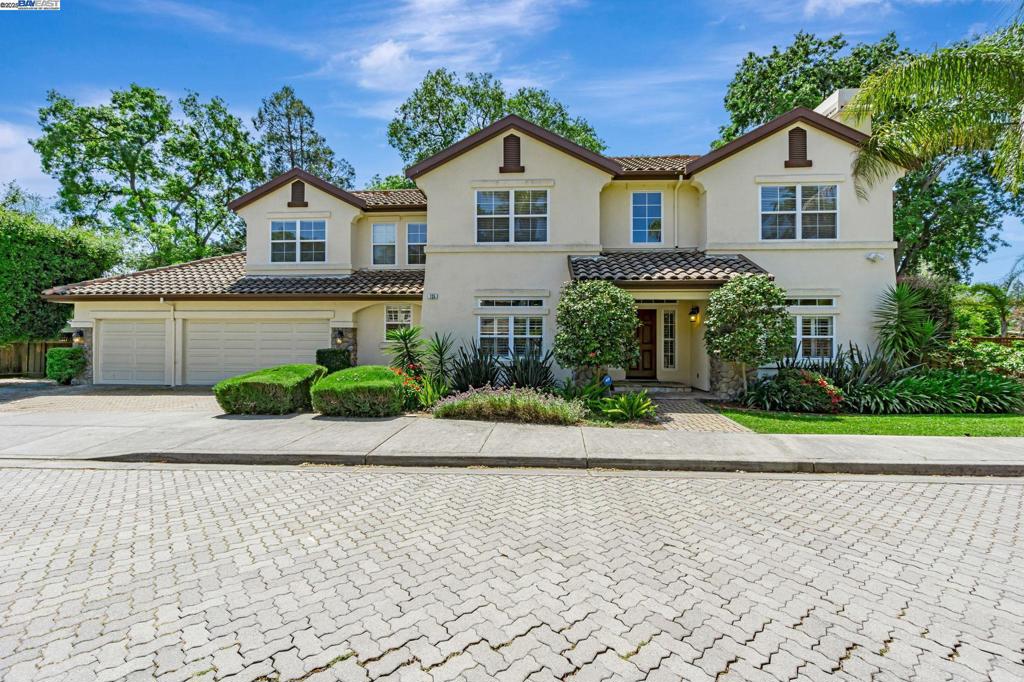 OPEN HOUSE SUN 8/17 1:30 - 4 PM! Magnificent home sits on a prestigious court location. This spacious home is beautifully upgraded with hardwood flooring and tile flooring throughout, newer interior paint, and exterior paint. Inviting entry with high ceiling leads to living room and formal dining room. Gourmet kitchen features granite slab counter tops, tile back splash, stainless steel appliances, center island, walk-in pantry, and spacious kitchen nook. Huge family room with cozy fireplace, ceiling fans, and plenty of windows attracting lots of natural lights. Luxurious master suite on the first level offers fireplace, over-sized walk-in closet with organizers, spacious master bathroom with dual sinks vanity and separate shower and jetted bath tub. Good size secondary bedrooms and 2 full baths are on upstairs. The beautiful vineyard in the backyard produce 300 bottles of good quality red wine per year. Great location with walking distance to BART, Broadway Plaza, Iron Horse trail...