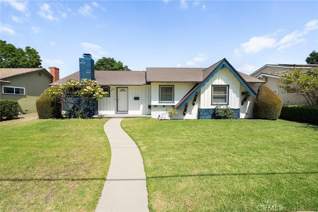 This is your opportunity to own a single level, mid-century modern home, located minutes from Downtown Disney and walking distance to Stoddard Elementary School & Park. Interior accommodations include 3 beds and 2 baths. The front entry leads to a spacious living room with hard wood floors and a fireplace. Other features include a large family room with lots of built-in cabinets, a bonus/dining room, and an oversized laundry room connecting to a bright skylit kitchen. Exterior amenities include a well-maintained front lawn and a backyard covered patio, mature fruit trees, and access to a detached two car garage. Come see for yourself!