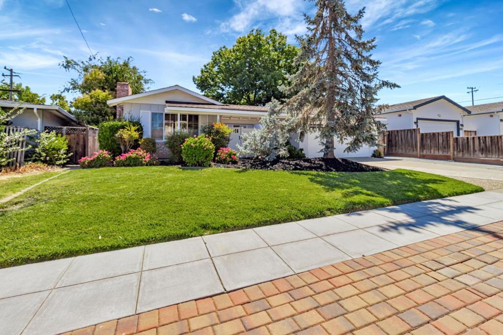 Charming Ranch style home located in the highly sought after Lynbrook High School area. As you pass the manicured front yard youll enter into the front courtyard, as you enter the home at the formal entry way you wil find the Living Room/Dining Room to the left with the updated kitchen situated between the Living Room/Dining Room and the Family room which looks onto the large rear garden. Three ample sized bedrooms, two remodeled baths. Double paned windows, new furnace/AC installed in 2018, copper plumbing, two car garage a well-cared for home. Close to Westgate and El Paseo Shopping Centers offering a variety of dinning, shopping and entertainment options. Great commute locations quick access to Highways 85 and 280, Sunnyvale-Saratoga Road, and Lawrence Expressway.