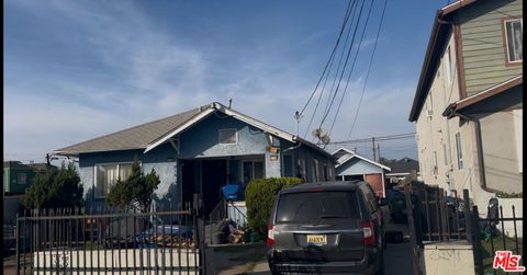 Photo of 719 W 55th Street, Los Angeles, CA 90037 (MLS # 26684773)