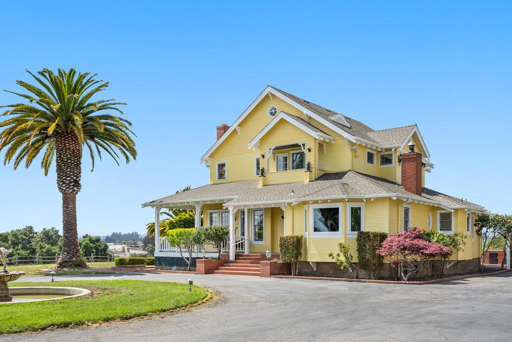 $100,000 Price Improvement. This is your once in a lifetime opportunity to own a home that has everything you could possibly want., a 2000sf wine cellar, a pool, a library, 2 ADUs, a finished attic and a barn with 2 stalls for horses. Nestled against the Mount Madonna foothills this 3 bedroom/2 bath home has had only one owner. As you enter the home, you are greeted with a formal entrance and a 20+ foot ceiling. To your right as you enter you will see oak bookshelves encircling the library. Cozy up with a book on your leather couch as you are warmed by the stove. There is a full bathroom and bedroom downstairs for easy access. The oversized living room is perfect for entertaining as you sit by a wood burning fireplace. The formal dining room can accommodate numerous family and friends for meals. The large farmhouse eat-in kitchen has stainless steel appliances including a gas stove, refrigerator, double ovens and dishwasher. You will enjoy the pine cabinets and pantry. The interior laundry room has a laundry chute. Upstairs you will find two bedrooms with a shared bathroom in addition to a walk-in closet. One bedroom having an additional room. The 3 car garage has a studio above as does the water tower. The barn includes a garage, two stalls for horses and a tack room.