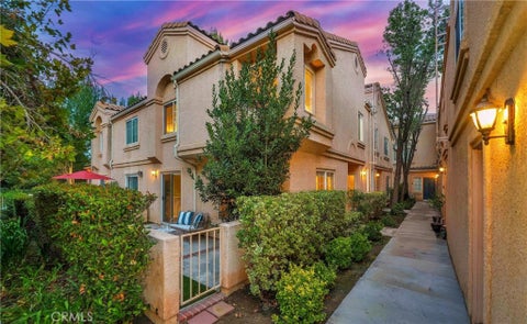 Photo of 25112 Steinbeck Avenue #D, Stevenson Ranch, CA 91381 (MLS # SR26199113)