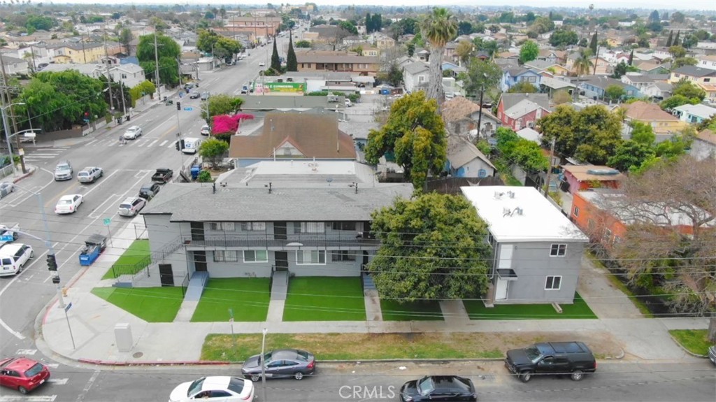We are pleased to present the 79th Street Apartments, an 8-unit multifamily property located in the rapidly evolving South Los Angeles submarket. The asset features (5) one-bedroom/ one-bathroom units, (1) two-bedroom/ one-bathroom unit, and (2) newly constructed Accessory Dwelling Units (ADUs) completed in 2025. The property sits on a corner lot totaling approximately 6,199 square feet.
The original six units have been fully renovated to include new flooring, modern kitchens and bathrooms, upgraded fixtures, new electrical systems, and fresh paint. The two newly built three-bedroom/ two-bathroom ADUs are highly upgraded, offering modern kitchens and bathrooms with quartz countertops, recessed lighting, individual water heaters, and A/C units.
Located just minutes from Downtown Los Angeles, USC, and major transit corridors including the 110 and 105 Freeways, this asset benefits from high rental demand and convenient access to job centers throughout the city. The 90003 zip code is undergoing significant transformation with new development, city reinvestment, and infrastructure improvements driving interest from investors. The area continues to show strong rental fundamentals, improving demographics, and considerable upside as surrounding neighborhoods gentrify.