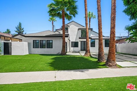 Photo of 16113 Gledhill Street, North Hills, CA 91343 (MLS # 25561047)