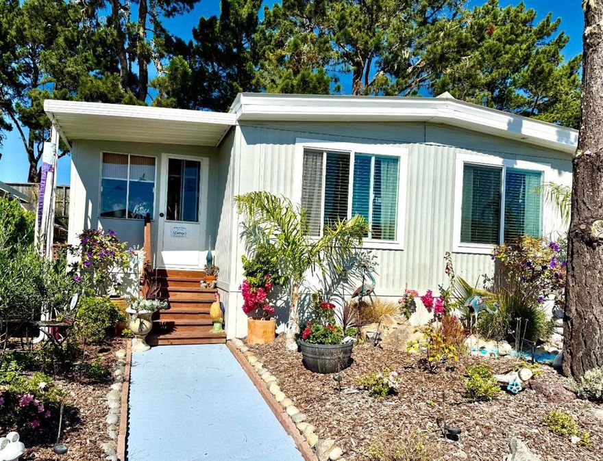 Welcome to your new home in the charming city of Half Moon Bay! This cozy residence offers 2 bedrooms and 1 full bathroom equipped with modern amenities throughout, including an updated bathroom with granite finishes. The well-appointed kitchen boasts essential appliances such as a dishwasher, garbage disposal, microwave, oven range with gas, and a refrigerator, making meal prep a breeze. The convenience of an in-home washer and dryer for your laundry needs. Energy-efficient double pane windows help maintain the home's comfortable climate, supported by central forced air heating Enjoy your meals in the formal dining room while the separate family room provides a perfect space for relaxation. The home features durable vinyl/linoleum flooring throughout, adding both style and functionality. Leading out to the backyard oasis is a fully enclosed sun-room. The home also features a wrap around fence as well as a well positioned deck and backyard retreat perfect for privately relaxing or entertaining guests.