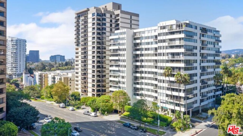 Renovated & chic New York style 2-Bed. /2-Bth corner unit condo with spectacular views in the prestigious Wilshire Holmby, a full-service high-rise on Wilshire Corridor. Formal entry hallway, spacious & sun-filled living & dining area, remodeled kitchen with custom cabinetry, granite counter tops & stainless- Steel appliances, great primary suite with generous closet space, plantation shutters, hardwood floors & sensational city & mountain views! Building offers 24-hours valet & security along with great amenities including pool, gym, & recreational room.