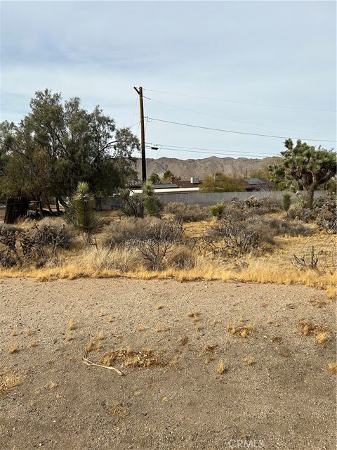 Photo of 0 Piute trail, Yucca Valley, CA 92374 (MLS # IG25231697)