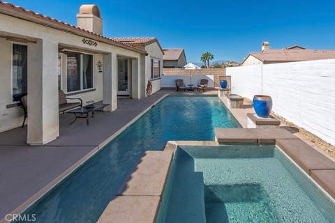 Photo of 84206 Canzone Dr, Indio, CA 92203 (MLS # SB26094865)