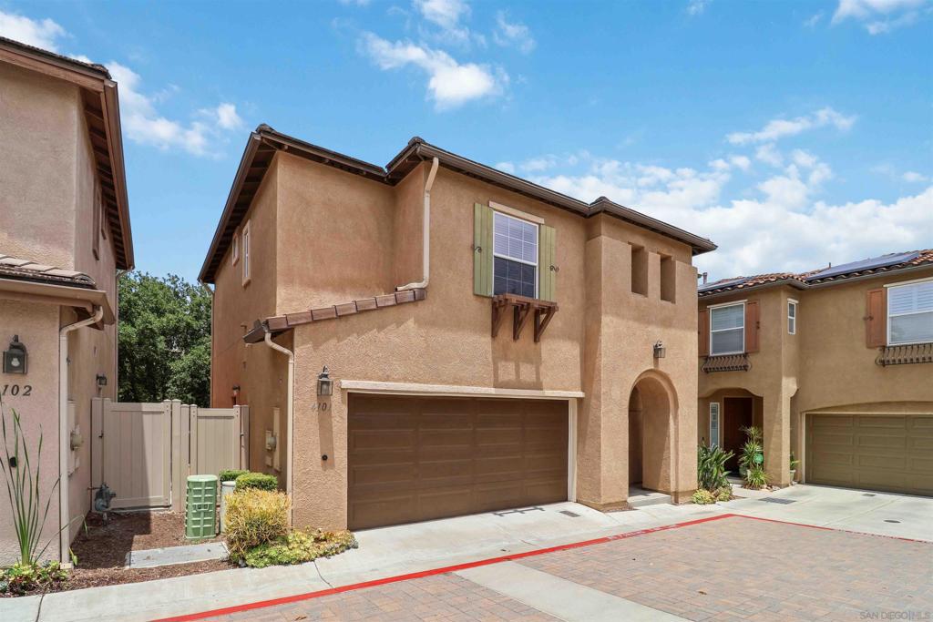 Bright and updated home in the gated community of Bonita Creek featuring a quiet and private backyard that backs to open space serene views with no neighbors behind! Open and airy floor plan, this well-maintained home has brand-new stainless-steel stove/range and offers 3 bedrooms 2.5 baths plus an upstairs loft - idea for a office or kids' playroom. Enjoy high ceilings, spacious living room with a cozy fireplace, and tile flooring throughout the main level. Kitchen granite countertops. Spacious master suite has a soaking tub, walk-in shower, dual sinks, large walk-in closet, and a private serene view. Another upstairs bedroom also offers a walk-in closet. Additional highlights include dual-pane windows, new paint, central A/C, new vinyl fence, and laundry room upstairs. Low-maintenance backyard provides a quiet, natural setting surrounded by mature trees—perfect for ultimate privacy. 2-car garage has overhead storage and epoxy flooring. Complex offers a swimming pool and hot tub. Easy access to the freeways and walking distance to Plaza Bonita!