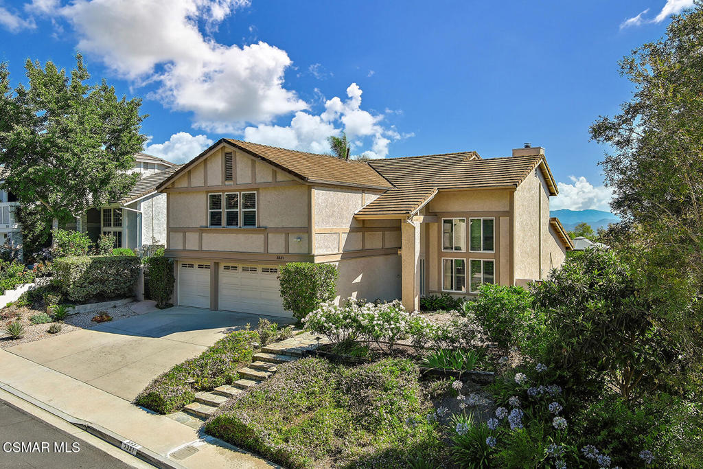 ZONED FOR LANG RANCH ELEMENTARY SCHOOL! NO HOA. Gorgeous turnkey view home with in-ground pool and spa is ideal for entertaining. Seasonal sunsets are spectactular. Walk through the modern front door to an open floor plan with vaulted ceilings above the living room and a bonus sunken living room with a fireplace. Remodeled kitchen with granite countertops, stainless steel appliances, custom Crystal cabinets and travertine floors opens to a family room with a cozy banquette eating area, seating area and wet bar. The sliding glass door leads to the pool and spa, gazebo and a view of the Santa Monica Mountains. A formal dining room features a sliding door to the side yard. Upstairs features a large primary bedroom with a separate seating area and a remodeled primary bathroom with a free-standing bathtub, shower stall, vanity and his-and-hers walk-in closets with built-ins. A comfortable loft is a perfect office/play area. Lots of storage. Roof was replaced in 2016, HVAC system was replaced with a dual-zoned system and moved to attic in 2020. The home backs up to open space, ensuring no construction below. Drought-tolerant landscaping, fruit trees and Sunset Hills Park is right across the street. House is districted for award-winning Conejo Valley Unified Schools Lang Ranch ES, Los Cerritos MS and Westlake HS. Convenient to shopping and freeways.