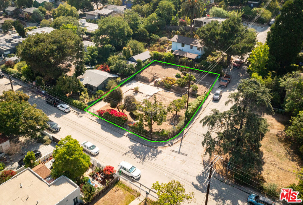 Presenting a rare development opportunity in the heart of Echo Park's coveted Elysian Heights neighborhood, this generously sized, double corner lot spans 7,244 sq ft. It offers incredible potential for new construction in one of LA's most creative and in-demand enclaves. Set just west of Elysian Park, the land sits elevated in the hills with lush bougainvillea lining the front fence, offering both charm and privacy. Once home to a 1922-built residence, this lender-owned parcel is a unique canvas ready for a bold new vision. Double lots like this are a true rarity in the area, providing ample space for a striking single-family estate, a modern duplex, or an architectural compound; buyer to verify zoning and permitting options. Fenced and surrounded by a mix of eclectic hillside homes and artistic flair, this lot enjoys a serene setting with nearby nature and easy urban access. Whether you're looking to design a peaceful retreat or an income-generating property, the size, location, and character of this lot open the door to countless possibilities. Centrally located just a few blocks from Elysian Heights Elementary Arts Magnet and within a short distance to some of Echo Park's favorite spots: Bacetti Trattoria, Cookbook Market, Canyon Coffee, and Lady Byrd Cafe. With Elysian Park's scenic hiking trails just minutes away and quick access to the 5 and Glendale Freeways, as well as nearby Dodger Stadium and Downtown LA, this is a one-of-a-kind opportunity to create something truly special in a dynamic, up-and-coming neighborhood.